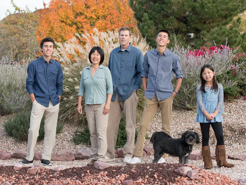 UWYC Board member Scott Lewis with wife, Mayumi, and their three children