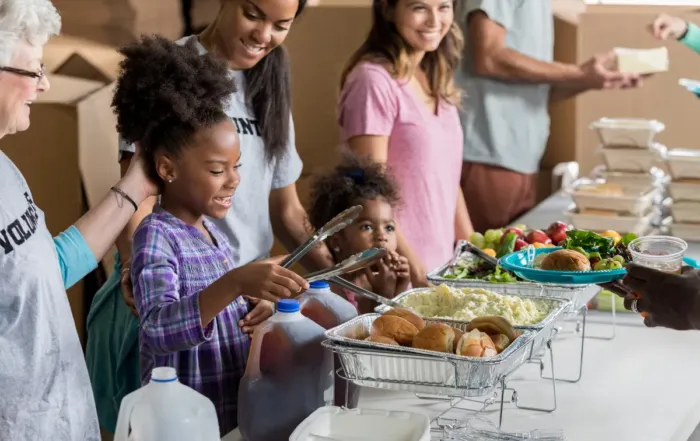 food insecurity in yavapai county volunteers handing foods